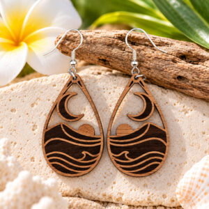 Walnut wood teardrop earrings with engraved ocean waves, crescent moons, sunset details, and silver fishhook ear wires.
