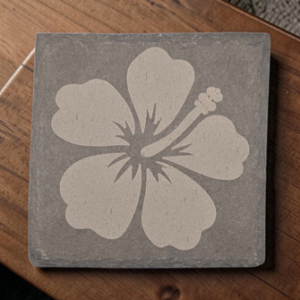 Square hibiscus slate coaster with a detailed laser-engraved tropical flower