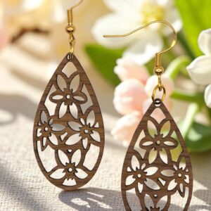 Star Flower Pattern Teardrop Natural Walnut Wood Dangle Earrings with intricate floral laser-cut details and gold fishhook ear wires